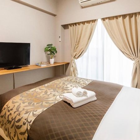 มิสเตอร์ คินโจะ อิน อะซะโตะ Aparthotel นาฮะ ภายนอก รูปภาพ