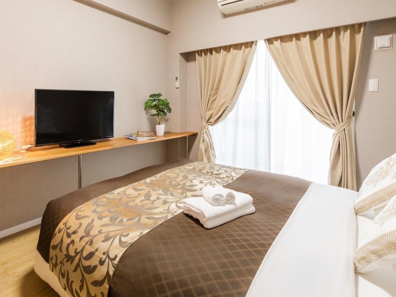มิสเตอร์ คินโจะ อิน อะซะโตะ Aparthotel นาฮะ ภายนอก รูปภาพ