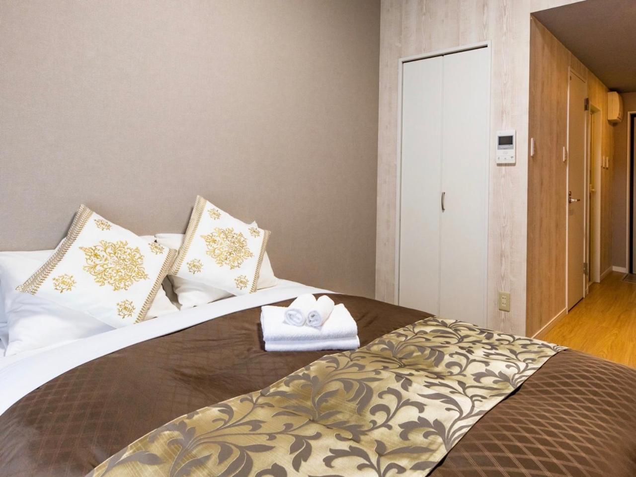 มิสเตอร์ คินโจะ อิน อะซะโตะ Aparthotel นาฮะ ภายนอก รูปภาพ